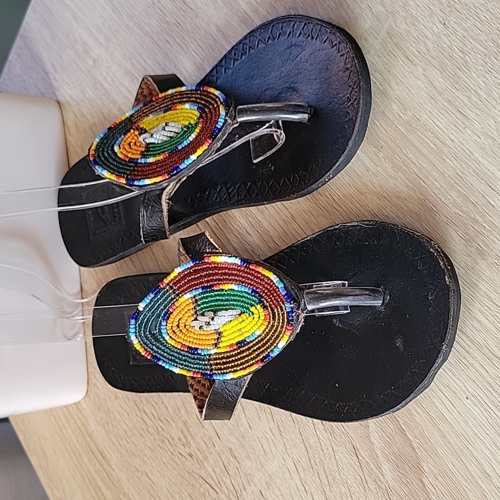 KAZI NI KAZI Leather beaded thong sandals.